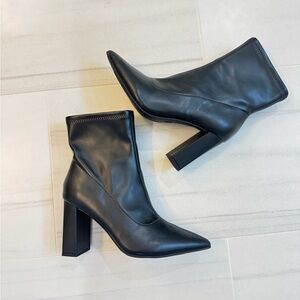 Black pointed toe boots. Size 7